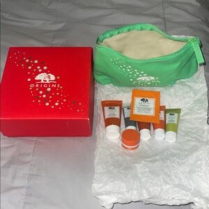 Origins cosmetic bag with Ginzing mini scrub eye/gel cream  masks drink up New